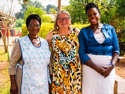  Resonate missionary Diana Boot with school faculty and staff in Uganda.