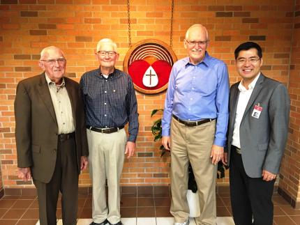 (Left to right) John Van Ryn, John Rozeboom and Ben Vandezande, former Home Missions directors, stand with Moses Chung, current director.