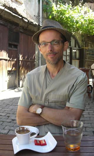 Douglas Howard with a cup of coffee