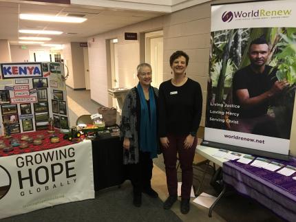  Laurie Kaniarz of Growing Hope Globally and Wendy Hammond from World Renew at the display of nativity sets at Friendship CRC.