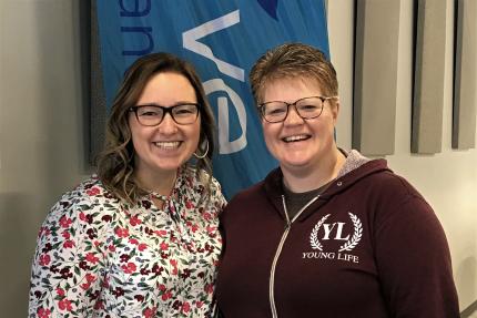 Allix (left) stepped up to help Carrie (right) plant Alive in Grandville.