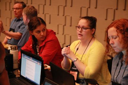 Rebecca Bokma (in yellow) told delegates that young adults wish there were more options for worship.