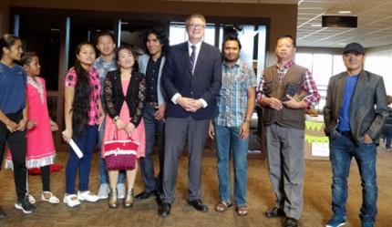 Bhutanese refugees in Sioux Falls pray for BTGMI ministry in Bhutan.