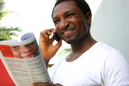 Kenneth Adams does phone consultations with young people who look to him for advice.