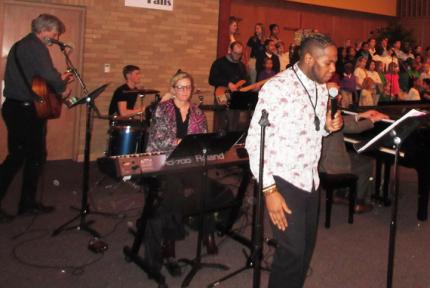 Emmanuel Philips leads worship at Millbrook CRC.