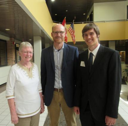 Ruth Veltkamp (left) is a member of the committee studying persecution. Kevin den Dulk is chair. Joshua Nederhood has done research.