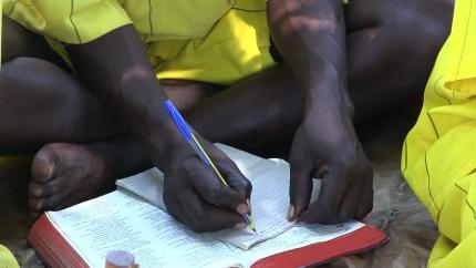 Inmates are eager to study the Bible.