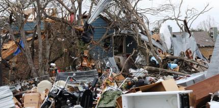 A pile of debris is all that is left of what used to be an apartment unit at the Landmark at the Lake Village West apartment complex after a tornado in Garland, Texas, on Dec. 28, 2015. 