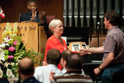 Tim Bossenbroek from Classis Chicago South got the first machine during an auction of the old synod voting machines.