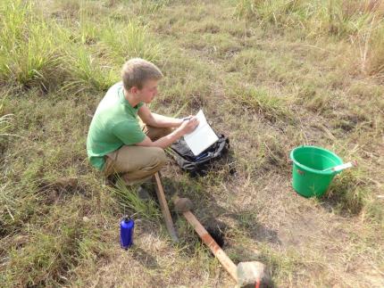 Wes Vanderhoek works in the field.